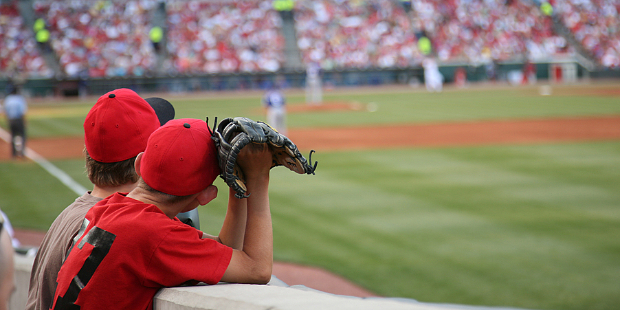 Fans wait to catch a fly ball at World Series